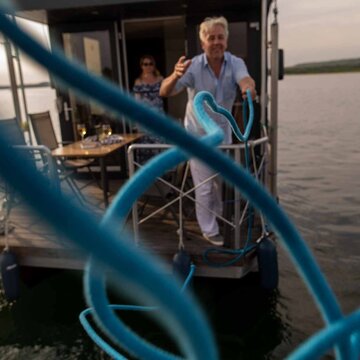 Ausflug mit einem Hausboot auf den Geiseltalsee bei Abendstimmung